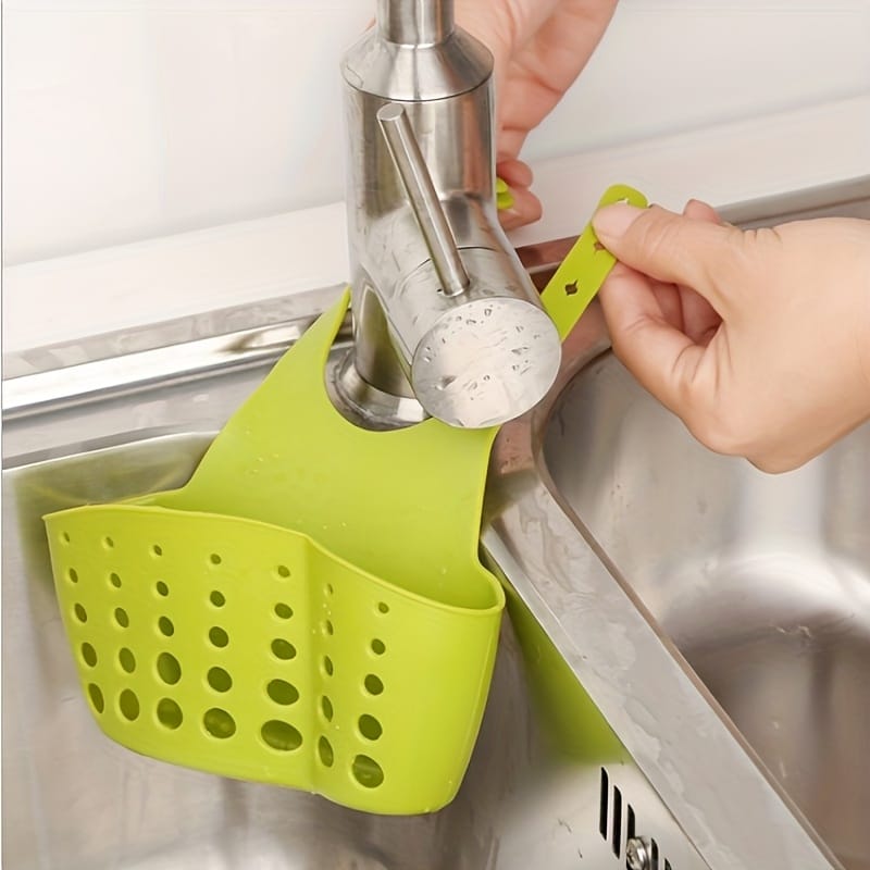 1pc Adjustable Kitchen Sink Organizer with Drain Hole - Heavy-Duty Faucet Sponge Holder, Space-Saving Countertop Storage Basket, Compatible with Sponge, Scrub Pad, Soap Bar - Under Faucet or Over Sink Installation - Durable Plastic Construction, Kitchen Sink Accessories, Perforated Design, Sturdy Construction, Home Cooks