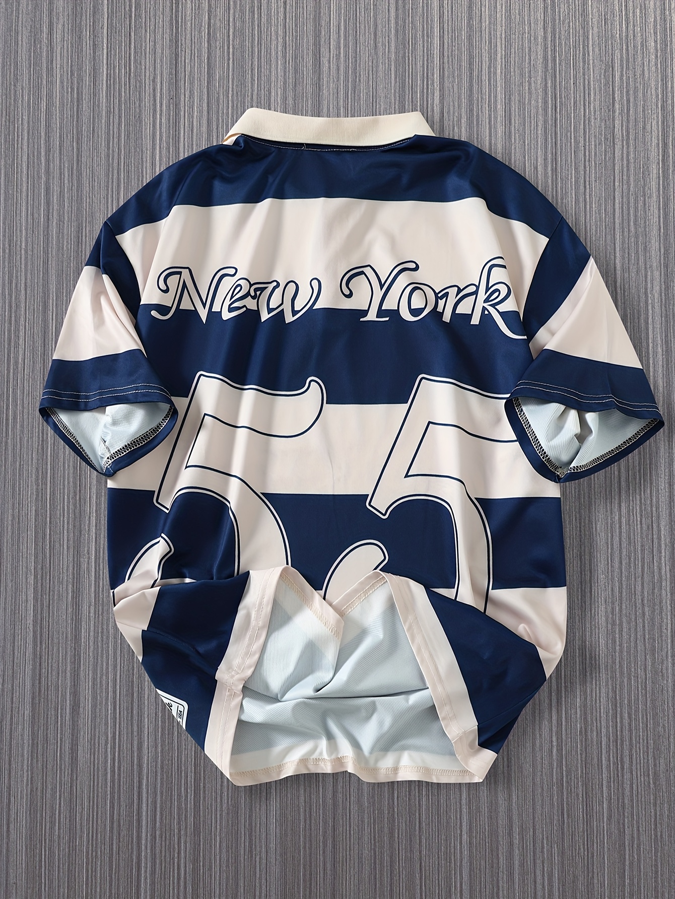 The 2025 New Blue And White Striped Short-Sleeve Polo Shirt Features a Stylish Collar Design. The New York-Themed Print Highlights Urban Trends, While The Breathable Fabric Ensures Comfort Against The Skin, Perfect for Spring And Summer. Versatile for Daily, Casual, And Business Occasions, It Effortlessly Creates a Gentlemanly Style. A Trendy Choice That Unlocks The Essence of New York, Injecting Fashionable Vitality Into Your Wardrobe And Showcasing Unique Charm!