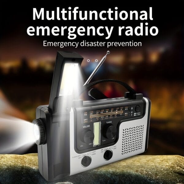 Emergency solar hand crank power emergency radio AM/FM/SW multi-band with LED flashlight, reading lamp, alarm, and mobile phone charging function.
