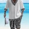 Men's casual vacation style set, white diamond patterned V-neck mid sleeved top paired with black and white geometric printed shorts