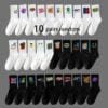 20 Pairs, 10 Pairs, 5 Pairs - Random Color Letter Print Socks, Stylish Mid-Calf Athletic Socks for Basketball, Outdoor & Casual Wear, Polyester Knit Fabric, Hand Washable, Everyday Socks | Vibrant Sock Design | Comfortable Fit