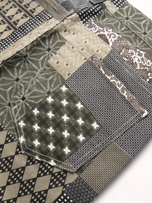 Stylish Patchwork Denim Jeans with Random Print Pattern