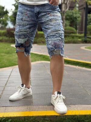 Men's Distressed Frayed Hem Jeans Shorts - Light Wash Blue Denim Mid-Rise Relaxed Fit Five-Pocket Casual Summer Shorts with Frayed Hem & Raw Edge Design for Casual Attire, Beach, and Outings | Trendy Men's Fashion Statement Piece