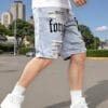 product-fancy-5bbc5eeb-711a-4bb7-aad3-c8bde45402bc Men's Summer Lightweight Denim Shorts - Knee-Length Relaxed Fit Distressed Casual Shorts with Portrait Print, 52% Blend, Hand Wash Only