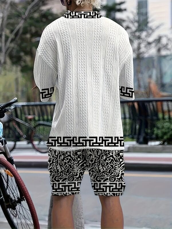 Men's casual vacation style set, white diamond patterned V-neck mid sleeved top paired with black and white geometric printed shorts