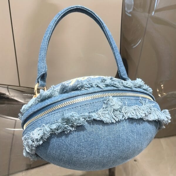 product-fancy-68566c63-c1e4-43ec-a0a4-f20e20cb162e Denim Football-Shaped Handbag with Fringe and Adjustable Strap - Blue, Casual Style, Zip Closure, PU Lining - Perfect for Football Fans