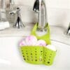 1pc Adjustable Kitchen Sink Organizer with Drain Hole - Heavy-Duty Faucet Sponge Holder, Space-Saving Countertop Storage Basket, Compatible with Sponge, Scrub Pad, Soap Bar - Under Faucet or Over Sink Installation - Durable Plastic Construction, Kitchen Sink Accessories, Perforated Design, Sturdy Construction, Home Cooks