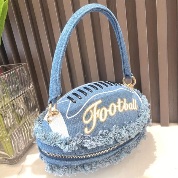 product-fancy-dbfaded6-4729-4a28-b5f1-7eb3570d6c7a Denim Football-Shaped Handbag with Fringe and Adjustable Strap - Blue, Casual Style, Zip Closure, PU Lining - Perfect for Football Fans