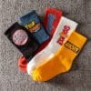 product-fancy-de6deb03-cbfa-412f-bafa-fae57c074143 5 Pairs Men'S Elastic Ribbed Cuff Socks - Bold Letter Graphic Print, All-Season Comfort, Multi-Color Options for Casual & Formal Wear, Hand Wash Only, Versatile Sock Styles, Trendy Sock Designs, Comfortable Sock Material, Everyday Essentials, Modern Sock Design, Breathable Fabric, Unisex Socks, Fashion Enthusiasts