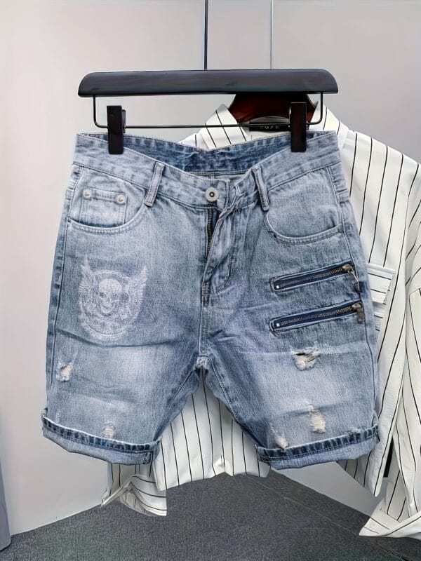 product-fancy-e47fa446-c442-432d-b457-c7c74170e42a Men's Distressed Denim Shorts with Skull & Sickle Print, Zipper Details, and Faux Pockets - Street Style Knee-Length Halloween Design