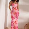 23d133b9-309f-4d3a-a5b0-d60e3b6081f2.jpg Robe longue moulante à imprimé floral pour femme - Sans manches, dos nu, bretelles croisées, motif floral rose et blanc, idéale pour les vacances, les rendez-vous galants, les fêtes, la plage et les tenues décontractées. Robe de plage