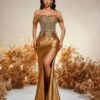 Robe moulante élégante à une épaule et sequins dorés, avec jupe perlée sur les hanches. Robe de soirée longue sans manches style sirène pour bal, mariage, demoiselle d'honneur, remise de diplôme et soirée. Ourlet sirène, détail noué au dos. Robe de soirée formelle.