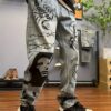 product-fancy-2dc03de6-3fae-477d-ad4a-851e675bfc12 Retro Blue American Streetwear Graffiti Print Loose Straight-Leg Jeans