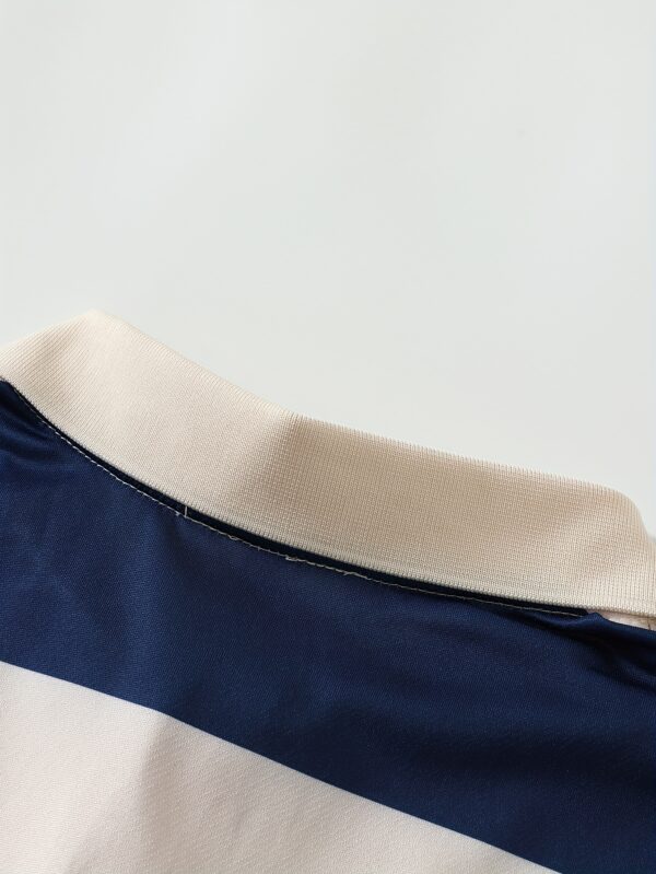 The 2025 New Blue And White Striped Short-Sleeve Polo Shirt Features a Stylish Collar Design. The New York-Themed Print Highlights Urban Trends, While The Breathable Fabric Ensures Comfort Against The Skin, Perfect for Spring And Summer. Versatile for Daily, Casual, And Business Occasions, It Effortlessly Creates a Gentlemanly Style. A Trendy Choice That Unlocks The Essence of New York, Injecting Fashionable Vitality Into Your Wardrobe And Showcasing Unique Charm!