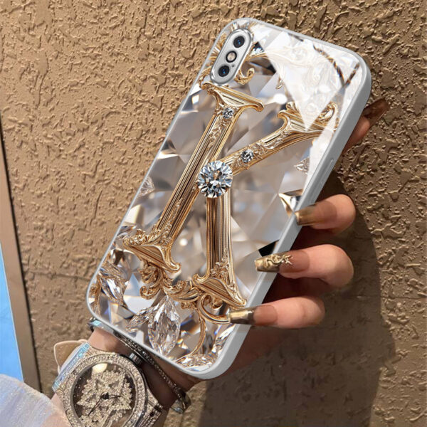 1f951a58c7cc4444839b9aade9dfe955-goods.jpeg A Robust And Durable Golden Diamond Letter Case Designed for Various for iphone Models, Including X, XR, Xs Max, 8, 7 Plus, And 6S SE, Featuring Electroplated Glass for Shockproof Drop Protection.