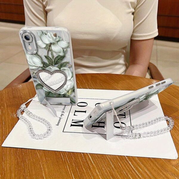 2cd4b2a7ec6d4f36891a47717e917cc2-goods.jpeg Durable iPhone XRPhone Cases Comfortable feel Delicate little flowers bracket and transparent beads Lanyard Pattern Case Suitable for iPhone XR Featuring Shockproof In Entertainment