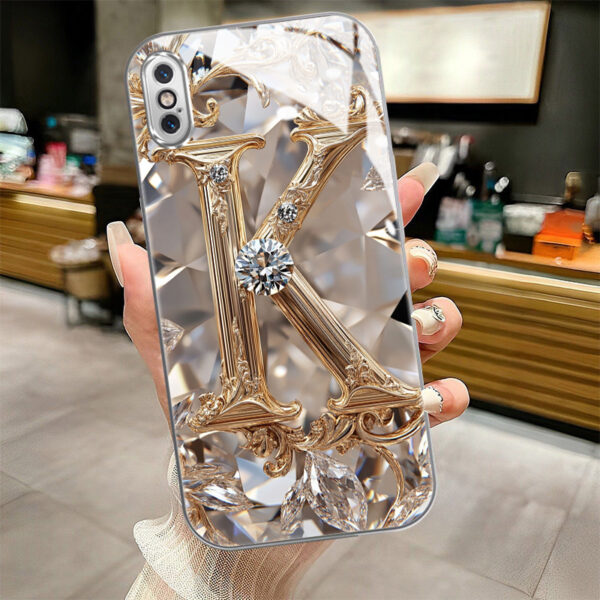 30829e3bc1c543dea5c7e9386ec65d94-goods.jpeg A Robust And Durable Golden Diamond Letter Case Designed for Various for iphone Models, Including X, XR, Xs Max, 8, 7 Plus, And 6S SE, Featuring Electroplated Glass for Shockproof Drop Protection.