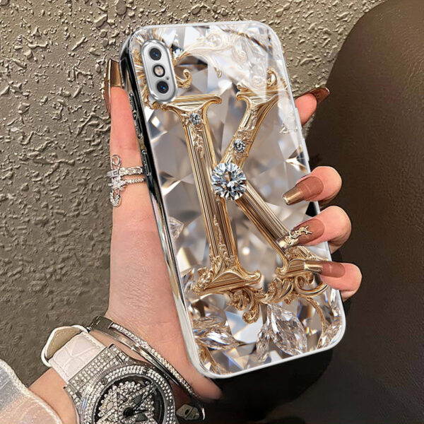 51d0ebd34bcd4a509a135525f61f0ad1-goods.jpeg A Robust And Durable Golden Diamond Letter Case Designed for Various for iphone Models, Including X, XR, Xs Max, 8, 7 Plus, And 6S SE, Featuring Electroplated Glass for Shockproof Drop Protection.
