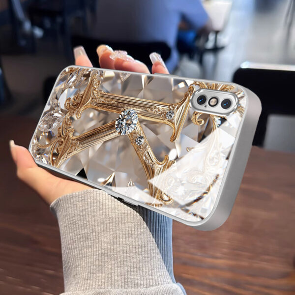 907e7e75941d44cbb9d090d1acdfd6b8-goods.jpeg A Robust And Durable Golden Diamond Letter Case Designed for Various for iphone Models, Including X, XR, Xs Max, 8, 7 Plus, And 6S SE, Featuring Electroplated Glass for Shockproof Drop Protection.