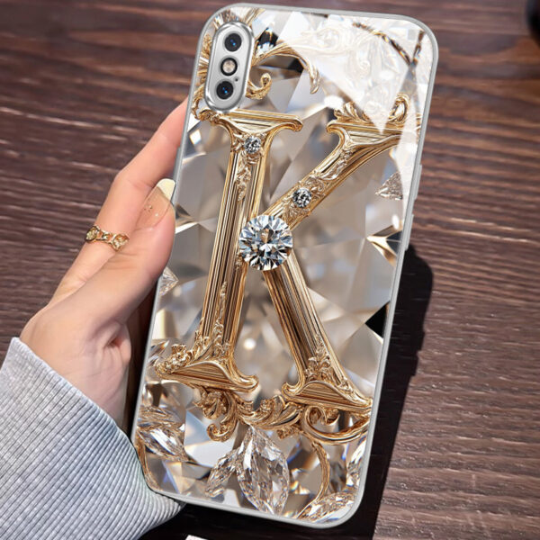 9676c79ad3d14544a5ee4b8bf7695cdc-goods.jpeg A Robust And Durable Golden Diamond Letter Case Designed for Various for iphone Models, Including X, XR, Xs Max, 8, 7 Plus, And 6S SE, Featuring Electroplated Glass for Shockproof Drop Protection.